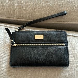 Black Kate Spade wristlet with front zipper